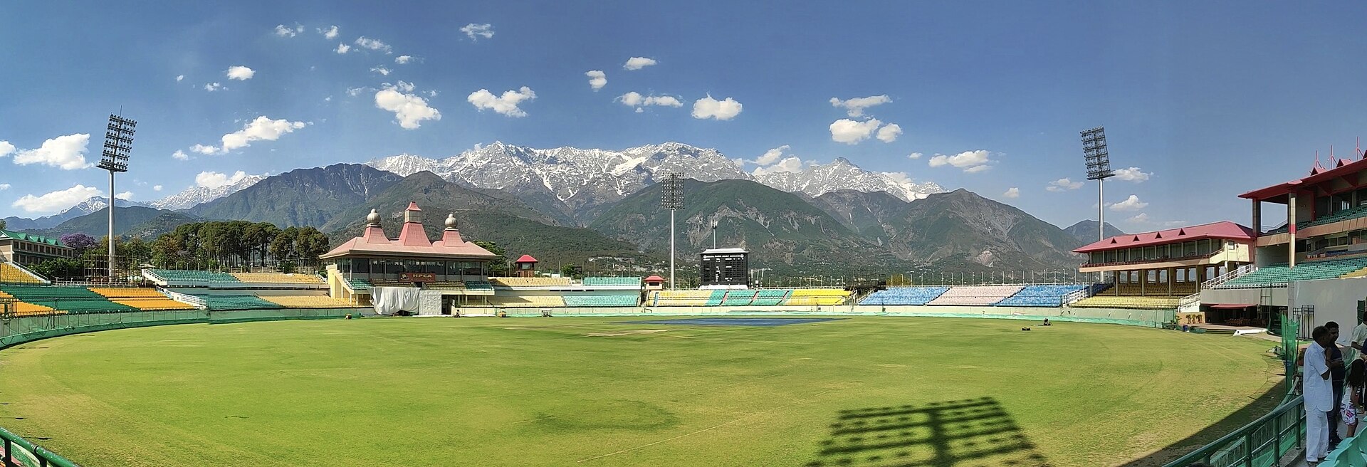 HPCA cricket stadium in Dharamshala with the Dhauladhar range behind
