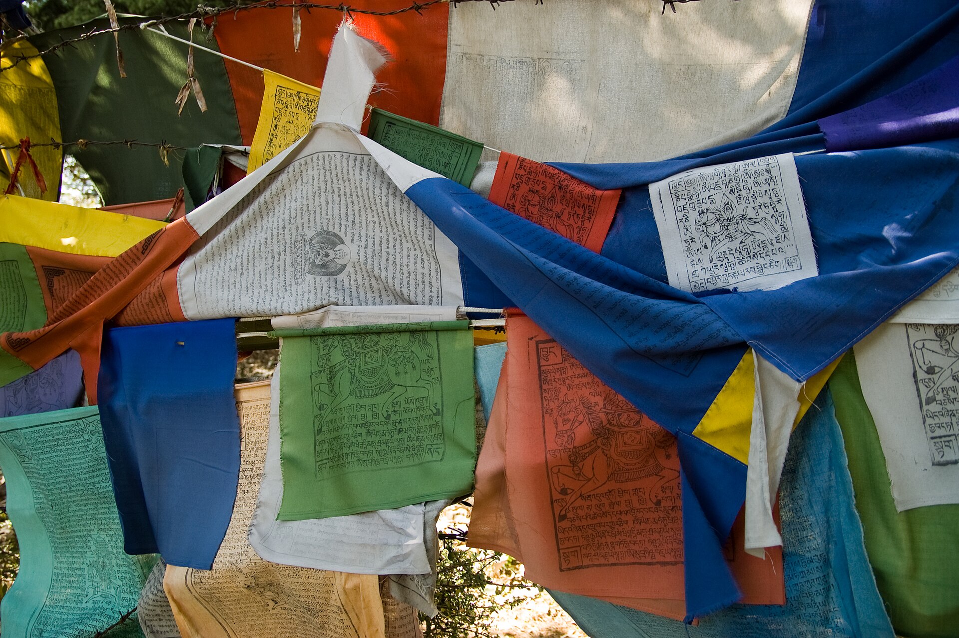 Tibetan prayer flags against the Dhauladhar mountains in Dharamshala